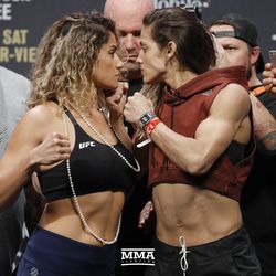 Pearl Gonzalez and Poliana Botelho square off at UFC 216 weigh-ins.