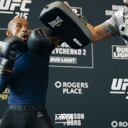 Demetrious Johnson does mittwork at UFC 215 open workouts at the Rogers Place in Edmonton, Alberta, Canada.