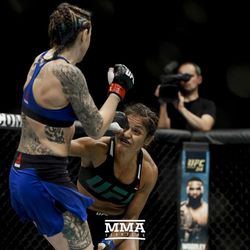 Cynthia Calvillo exchanges with Joanne Calderwood at UFC Fight Night 113 on Sunday at the The SSE Hydro in Glasgow, Scotland.