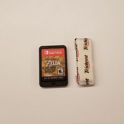 One stick of Trident peppermint-flavored gum is a smidgen taller than a physical copy of <em>Breath of the Wild</em> for Switch. 