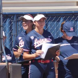 Danielle O’Toole gives signs from the Arizona dugout