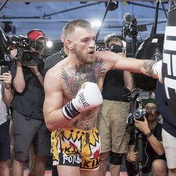 Conor McGregor throws a left at media workout.