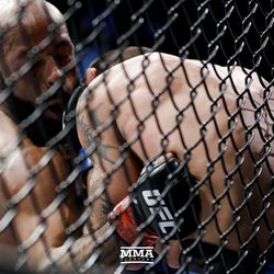 Demetrious Johnson lands a body shot at UFC 216.