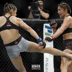Poliana Botelho lands a leg kick at UFC 216.