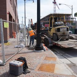 Concrete truck on Clark Street, as work is being done to complete the sidewalks and street at Waveland and Clark