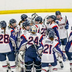 UConn women’s hockey team celebrates their win over Merrimack.