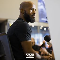 Demetrious Johnson listens to a reporter at UFC 215 media day at the Rogers Place in Edmonton, Alberta, Canada.