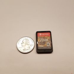 A quarter is a bit wider than a Switch card, but it’s otherwise shorter. 