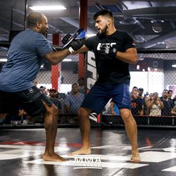 Kelvin Gastelum hits mitts with coach Rafael Cordeiro at UFC on FOX 25 open workouts Thursday at UFC Gym in New Hyde Park, N.Y.