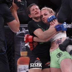 Alice Yauger and Heather Hardy hug after their Bellator NYC fight.
