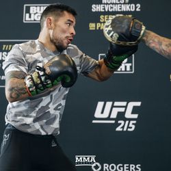 Ray Borg smashes pads at UFC 215 open workouts at the Rogers Place in Edmonton, Alberta, Canada.