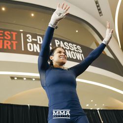 Amanda Nunes addresses the crowd at UFC 215 open workouts at the Rogers Place in Edmonton, Alberta, Canada.