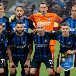 FC Internazionale Milano team line up before the Serie A match between FC Internazionale and ACF Fiorentina at Stadio Giuseppe Meazza on August 20, 2017 in Milan, Italy.