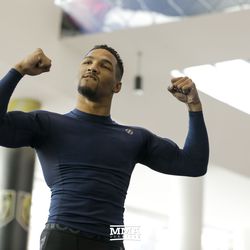 Kevin Lee flexes during the UFC 216 open workouts Thursday at T-Mobile Arena in Las Vegas.