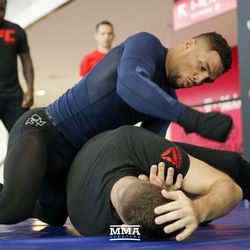 Kevin Lee feints some ground and pound during the UFC 216 open workouts Thursday at T-Mobile Arena in Las Vegas.