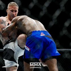 Justin Gaethje knees Michael Johnson in the body at TUF 25 Finale.