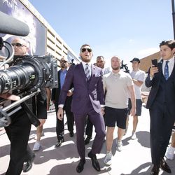 Conor McGregor makes his way to stage Tuesday.
