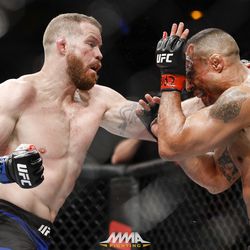 Nate Marquardt punches Vitor Belfort at UFC 212.