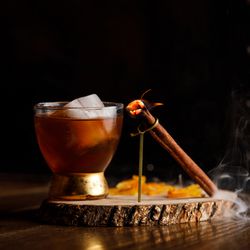 Smoked bohemian cocktail with Bowmore 12-year, Zucca amaro, Fort Point Manzanita beer reduction, orange bitters