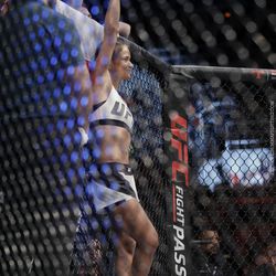 Karolina Kowalkiewicz waves to the crowd at UFC 212.