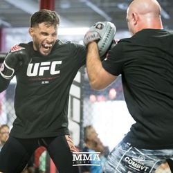 Dennis Bermudez mashing mitts at UFC on FOX 25 open workouts Thursday at UFC Gym in New Hyde Park, N.Y.