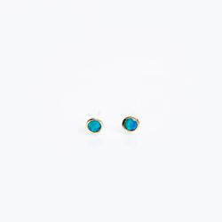 Kathryn Bentley <a href="https://www.wilderlife.com/kathryn-bentley-fine-jewelry-tiny-dot-studs-opal.html">Tiny Opal Dot Studs</a>, $240