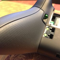 The controller can use Microsoft’s take on the paddles instead, which insert into these holes and uses a standard battery cover.