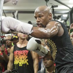 Floyd Mayweather hits the bag during his workout.