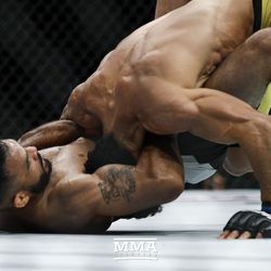 Rob Font looks for the finish at UFC 213.