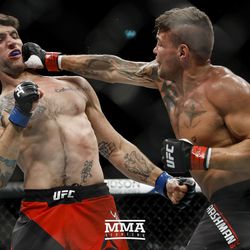 Jack Marshman lands a right hand on Ryan Janes at UFC Fight Night 113 on Sunday at the The SSE Hydro in Glasgow, Scotland.