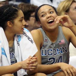 Napheesa Collier (R) shares a laugh with Gabby Williams (L)