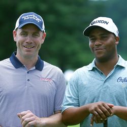 UConn Men’s Hockey coach Mike Cavanaugh and Harold Varner III at the 2017 Travelers Championship Pro-Am.<br>