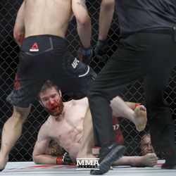 Mitch Clarke gets knocked down at UFC 215.
