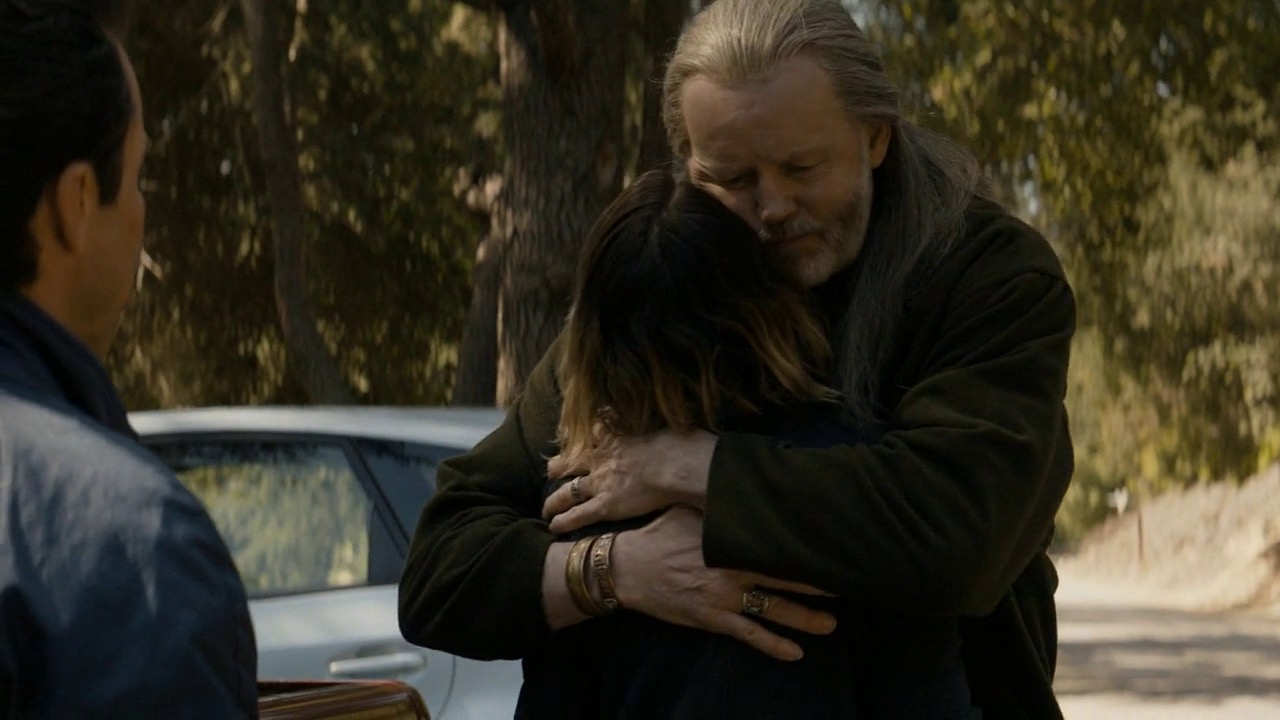 Ani and Eliot hug